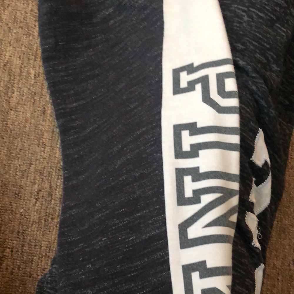 Pink black and white pants size small I think